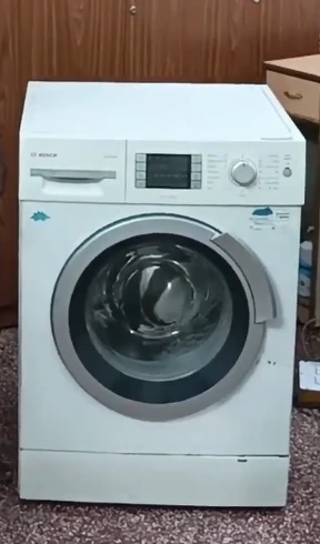 Front-load washing machine included in our washer repair services.
