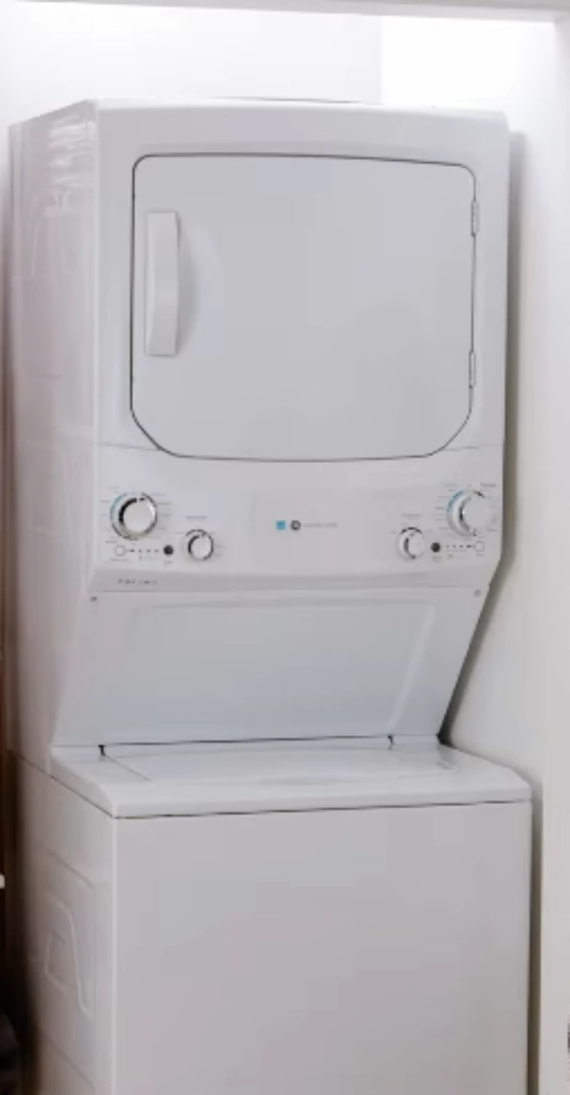 Stackable washer and dryer unit included in our repair services.