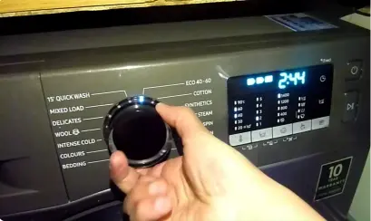 Technician diagnosing a washer spin issue in Albany NY